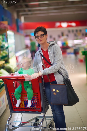 Image of mother with baby in shopping