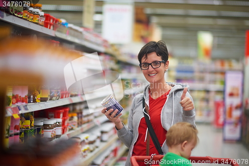 Image of mother with baby in shopping