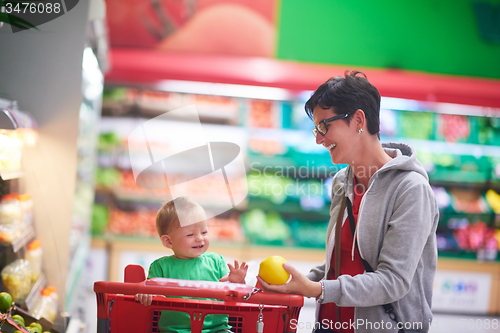 Image of mother with baby in shopping