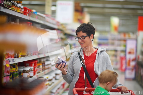 Image of mother with baby in shopping