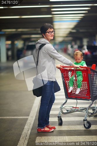 Image of mother with baby in shopping