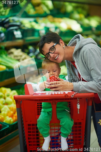 Image of mother with baby in shopping