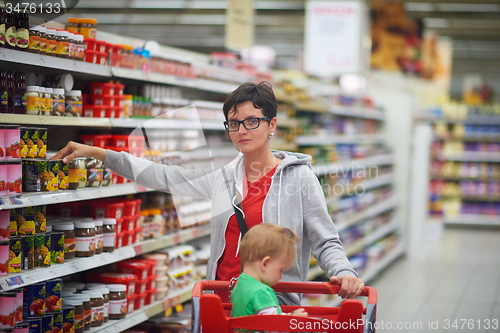 Image of mother with baby in shopping