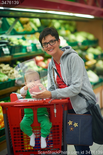 Image of mother with baby in shopping