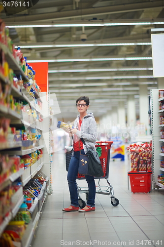 Image of mother with baby in shopping