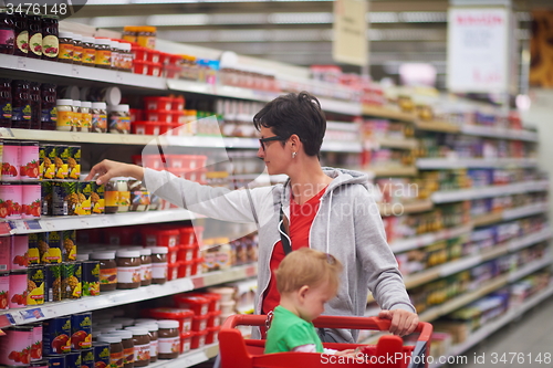 Image of mother with baby in shopping