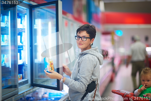 Image of mother with baby in shopping