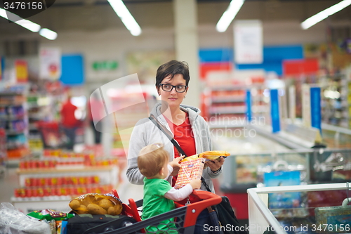 Image of mother with baby in shopping