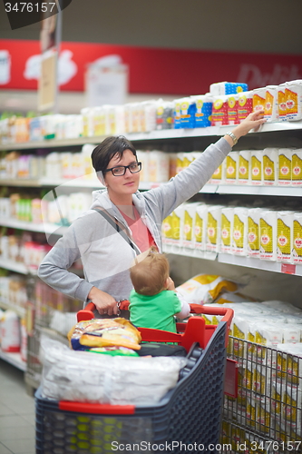 Image of mother with baby in shopping