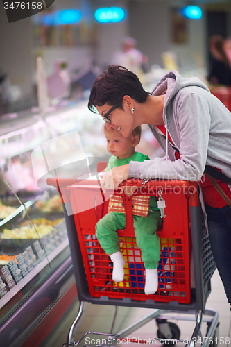 Image of mother with baby in shopping