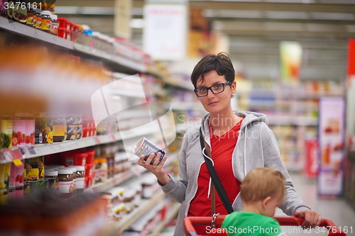 Image of mother with baby in shopping