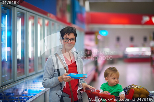 Image of mother with baby in shopping