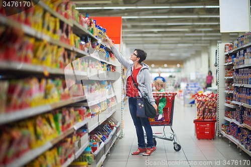 Image of mother with baby in shopping