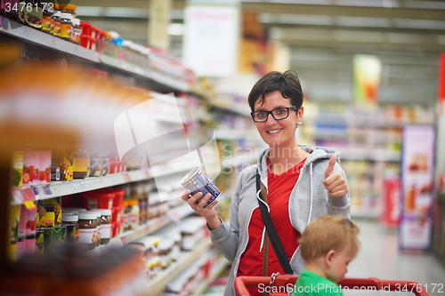 Image of mother with baby in shopping