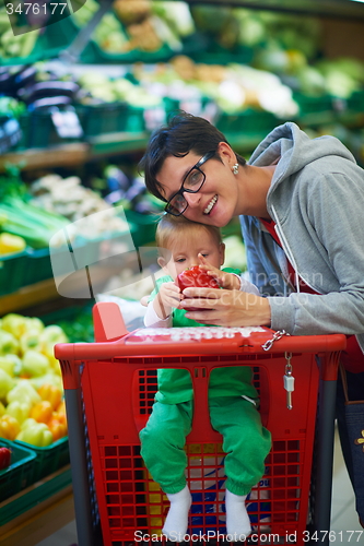 Image of mother with baby in shopping
