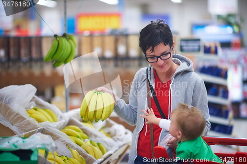 Image of mother with baby in shopping
