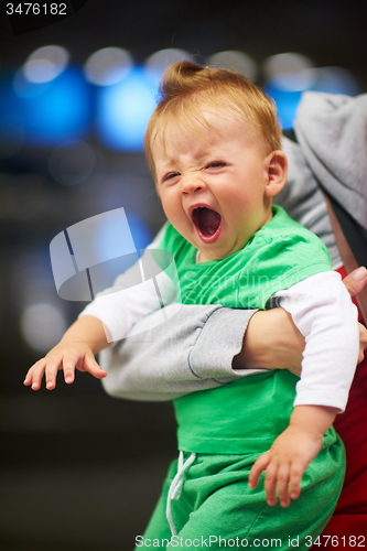 Image of mother with baby in shopping