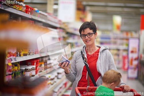 Image of mother with baby in shopping