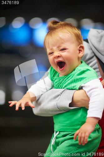 Image of mother with baby in shopping