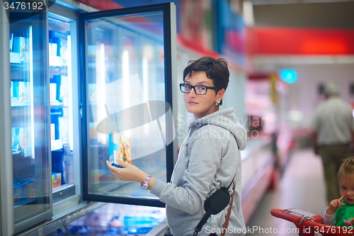 Image of mother with baby in shopping