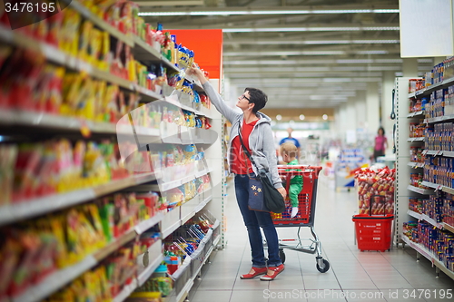 Image of mother with baby in shopping