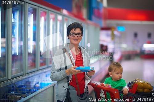 Image of mother with baby in shopping