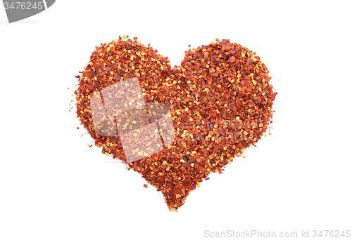 Image of Hot and spicy crushed chillis in a heart shape