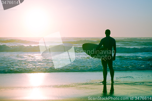 Image of Surfer watching the waves