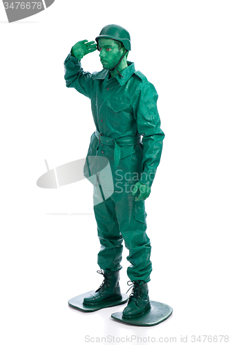 Image of Man on a green toy soldier costume