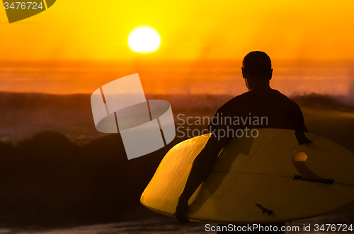 Image of Surfer watching the waves