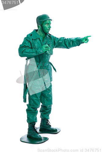 Image of Man on a green toy soldier costume