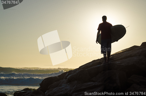 Image of Surfer watching the waves