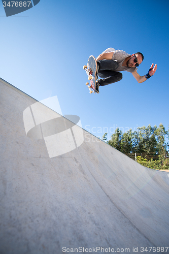 Image of Skateboarder flying