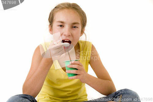 Image of Girl eating yoghurt I