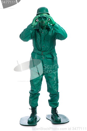 Image of Man on a green toy soldier costume