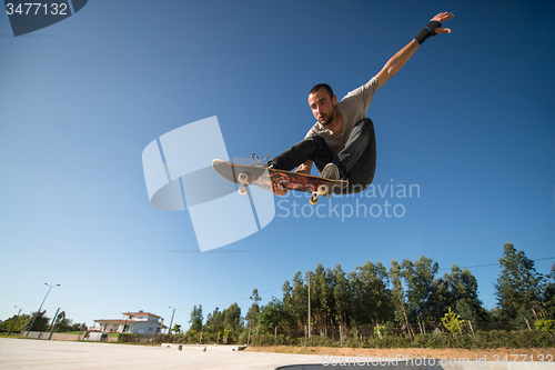 Image of Skateboarder flying