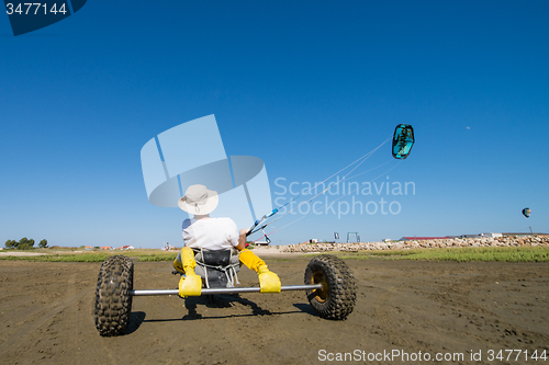 Image of Ralph Hirner riding a kitebuggy