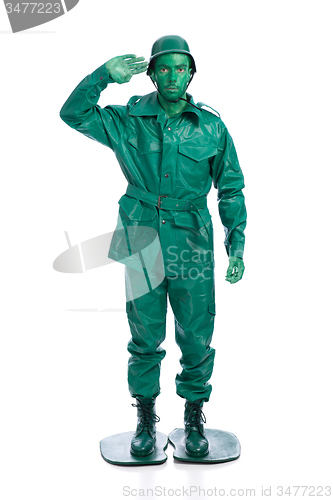 Image of Man on a green toy soldier costume