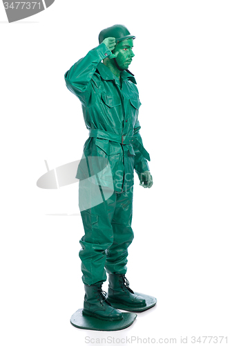 Image of Man on a green toy soldier costume