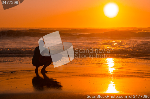 Image of Surfer watching the waves