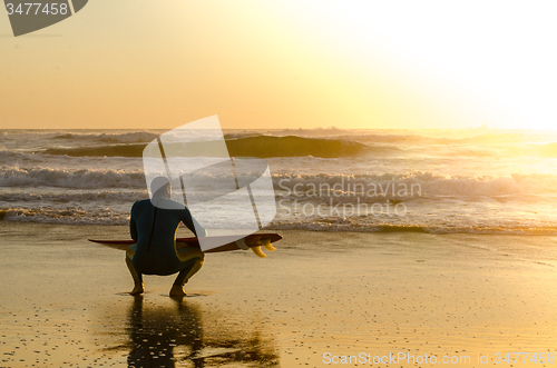 Image of Surfer watching the waves