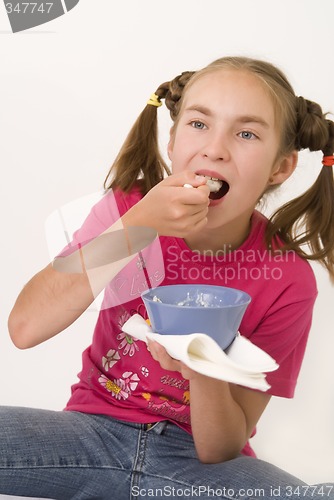 Image of Girl eating porridge II