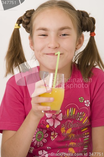 Image of Girl drinking orange juice II