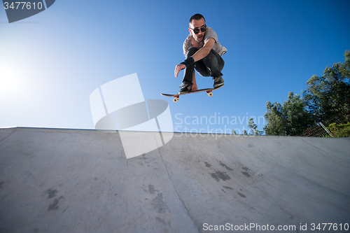 Image of Skateboarder flying