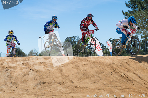 Image of Cruiser riders jumping