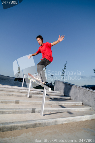 Image of Skateboarder on a slide