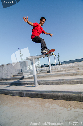 Image of Skateboarder on rail 