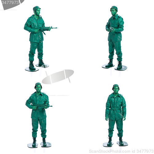 Image of Four man on a green toy soldier costume