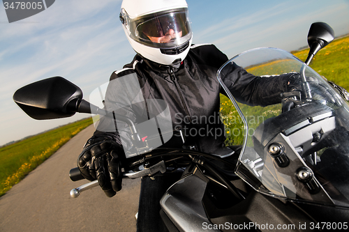 Image of Biker on the road