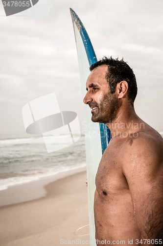 Image of Surfer wathing the waves